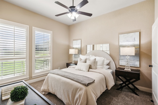 carpeted bedroom with ceiling fan