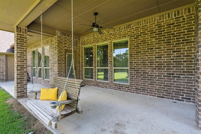 view of patio / terrace featuring ceiling fan