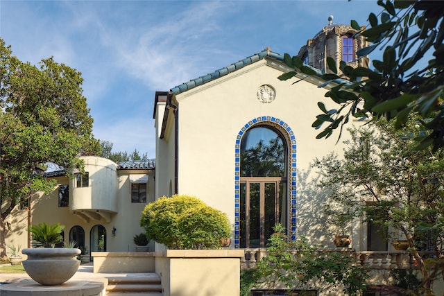 property entrance with a balcony