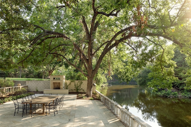 view of patio featuring a water view