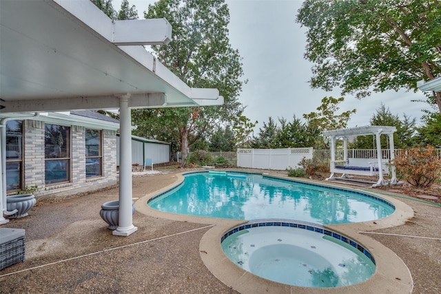 view of swimming pool with a patio, an in ground hot tub, and a pergola