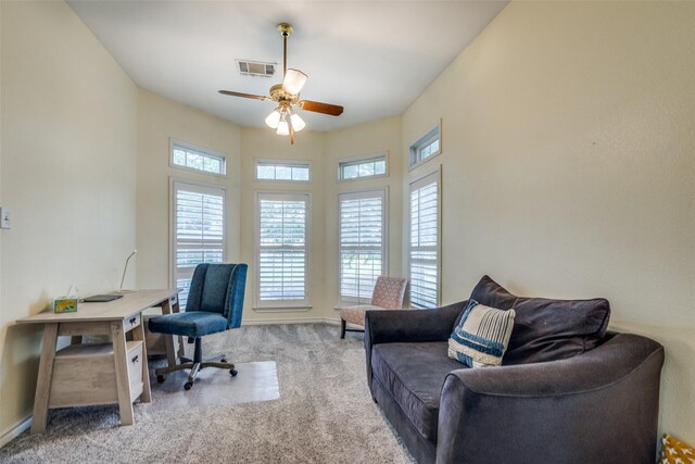 home office featuring ceiling fan and carpet flooring