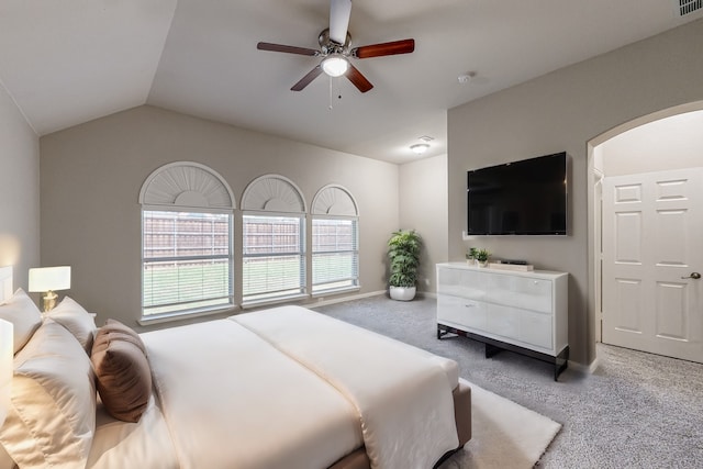 carpeted bedroom with lofted ceiling and ceiling fan