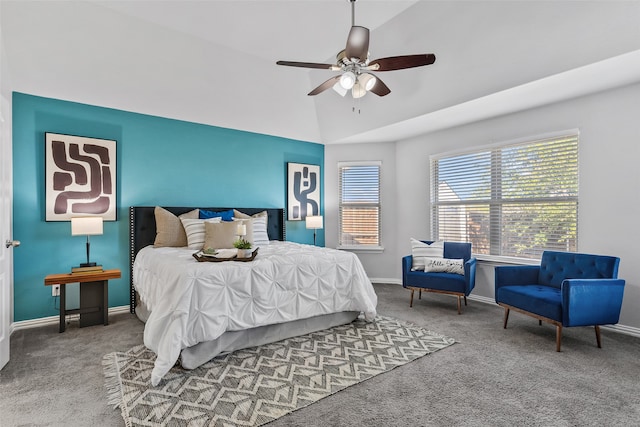 carpeted bedroom featuring ceiling fan and lofted ceiling