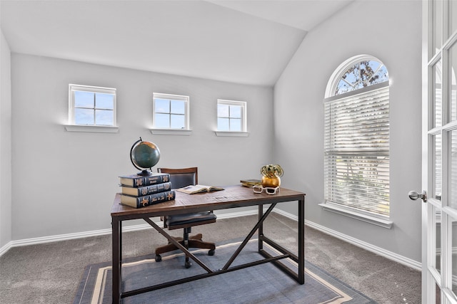 office area with dark carpet, french doors, and vaulted ceiling