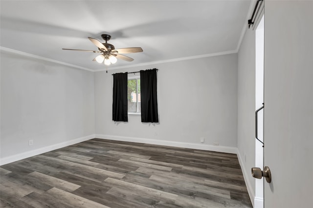 empty room with crown molding, hardwood / wood-style floors, and ceiling fan