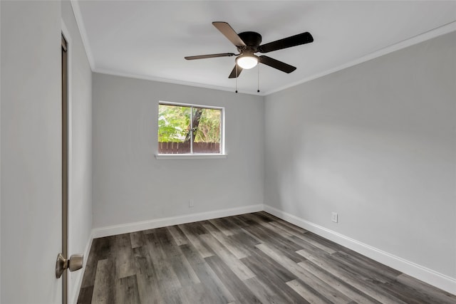 unfurnished room with ceiling fan, dark hardwood / wood-style floors, and crown molding