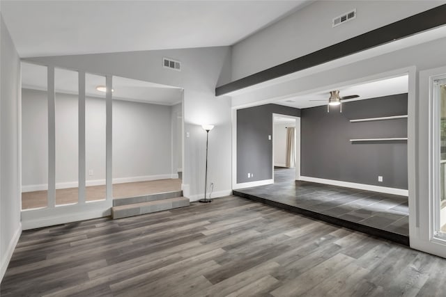 spare room with lofted ceiling, hardwood / wood-style floors, and ceiling fan