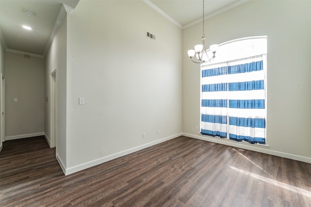 empty room featuring ornamental molding, dark wood-type flooring, and an inviting chandelier