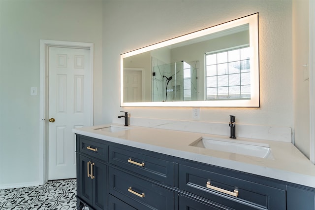 bathroom with vanity and a shower with door