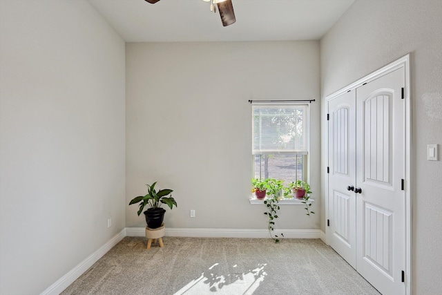 interior space featuring ceiling fan