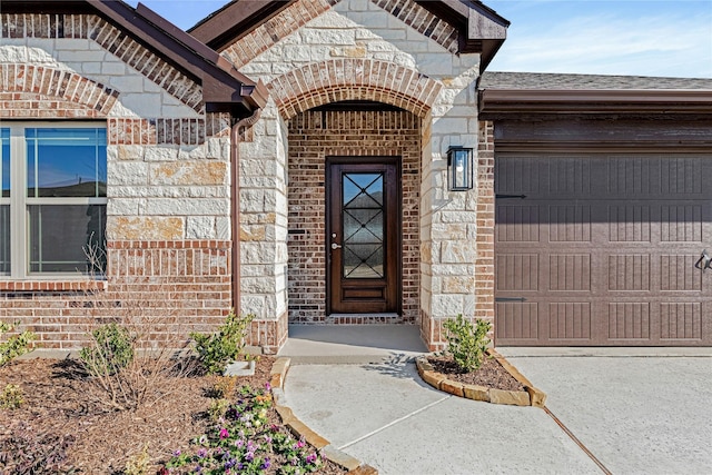 property entrance with a garage