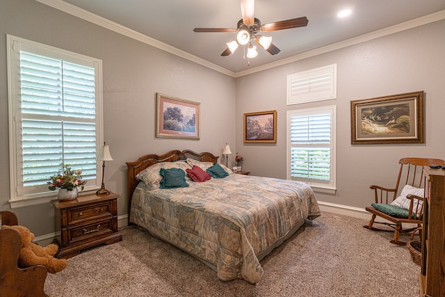 bedroom featuring ornamental molding, ceiling fan, and carpet