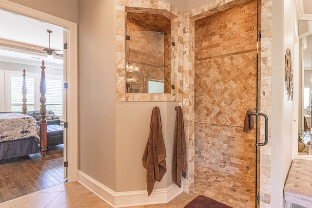 bathroom featuring ornamental molding, wood-type flooring, and walk in shower