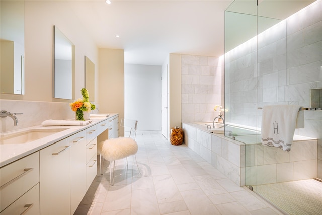 bathroom featuring plus walk in shower and vanity