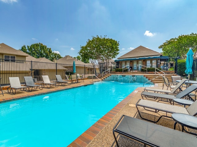 view of pool featuring a patio