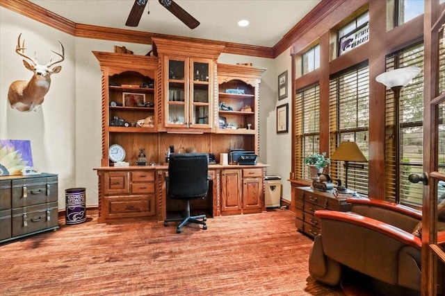 office area featuring light hardwood / wood-style flooring, ceiling fan, and ornamental molding