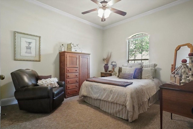 carpeted bedroom with ceiling fan and crown molding