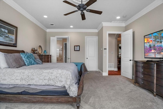 bedroom with carpet floors, ceiling fan, and ornamental molding