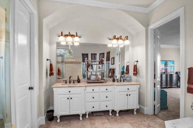 bathroom with vanity and ornamental molding