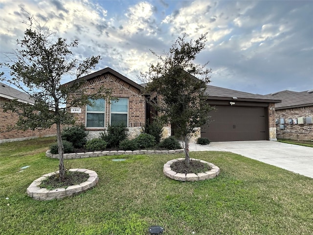 view of front facade featuring a garage and a front lawn