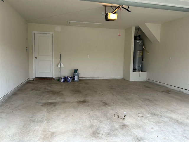 garage featuring water heater and a garage door opener