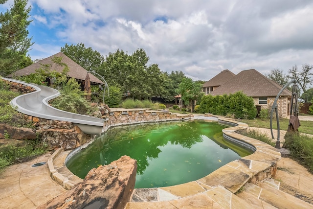 view of swimming pool featuring a gazebo