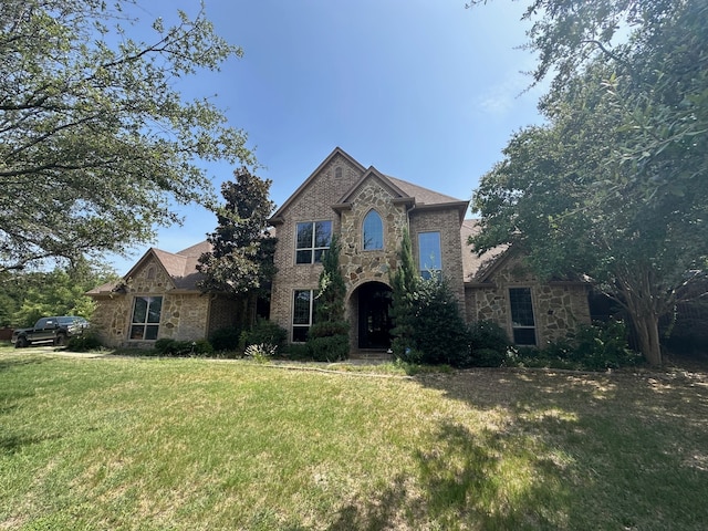 view of front of home with a front yard