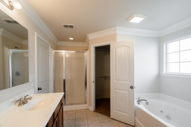 bathroom featuring vanity, separate shower and tub, ornamental molding, and tile patterned floors