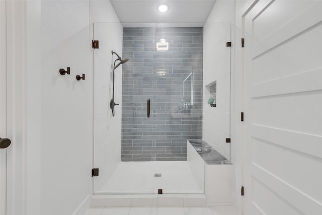 bathroom featuring a stall shower