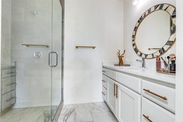 bathroom with vanity and an enclosed shower