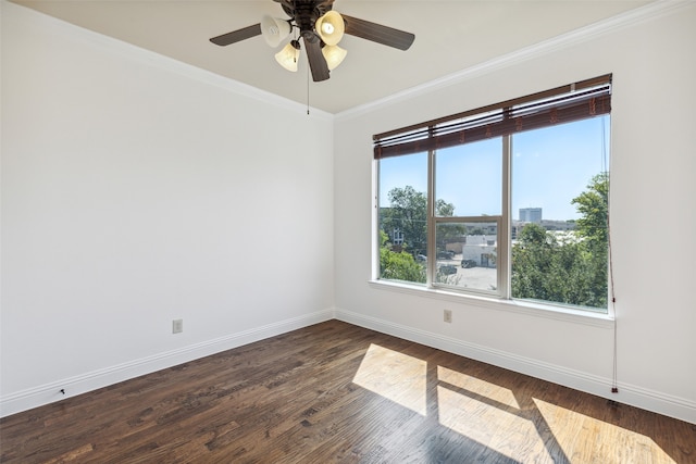 unfurnished room featuring crown molding, ceiling fan, and dark hardwood / wood-style flooring