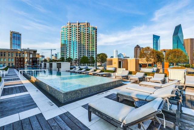 view of swimming pool featuring a patio area