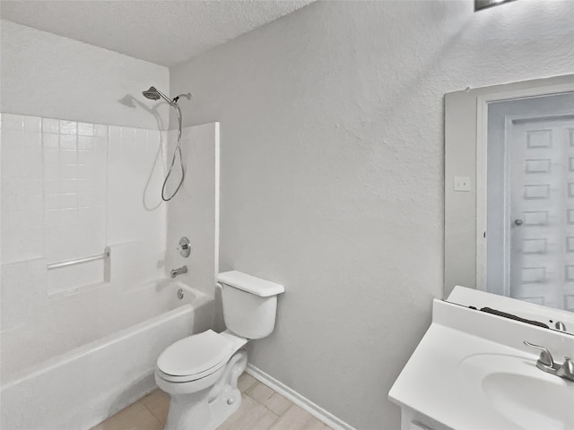 full bathroom featuring a textured ceiling, vanity, shower / washtub combination, tile patterned flooring, and toilet