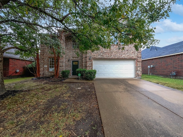 view of front of property with a garage