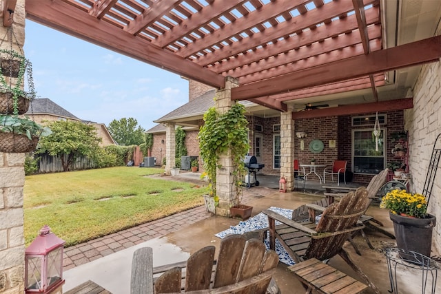 view of patio / terrace with a pergola, area for grilling, and central AC