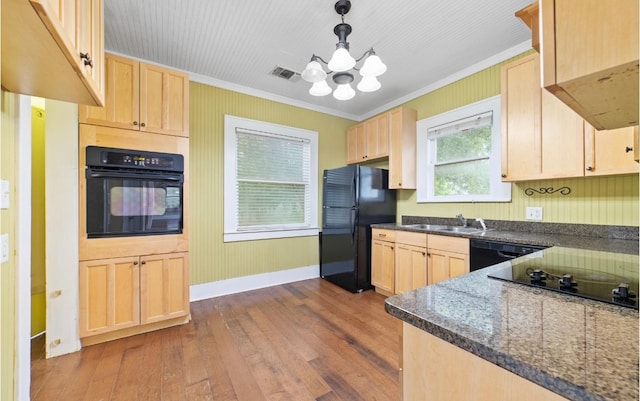 kitchen with an inviting chandelier, dark hardwood / wood-style flooring, black appliances, light brown cabinetry, and crown molding