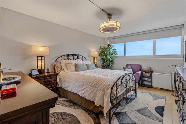 bedroom featuring light wood-type flooring