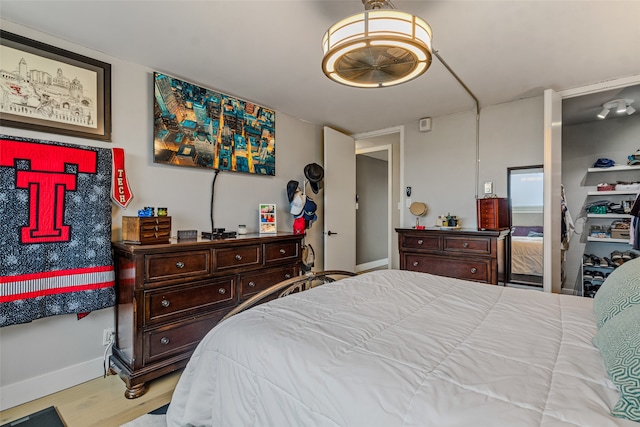 bedroom with light hardwood / wood-style floors