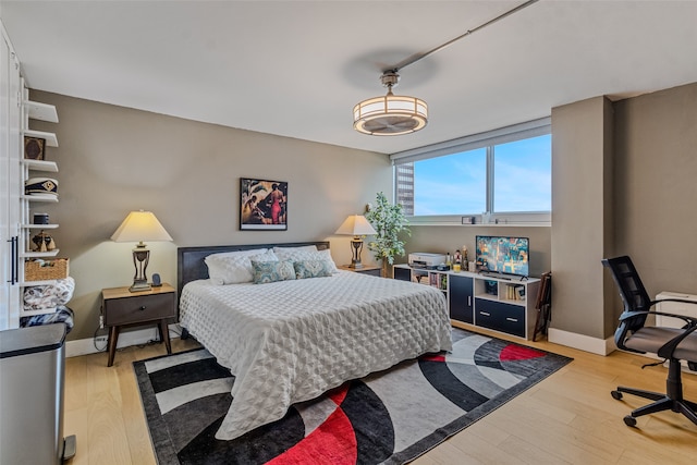 bedroom featuring light wood-type flooring