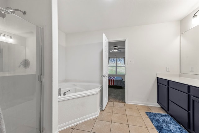 bathroom with tile patterned floors, ceiling fan, independent shower and bath, and vanity