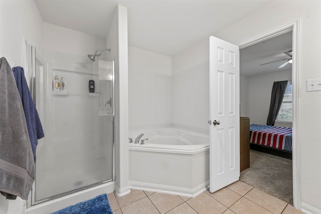 bathroom with ceiling fan, shower with separate bathtub, and tile patterned floors