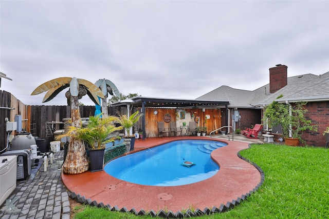 view of pool with a patio area