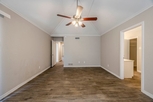 empty room with dark hardwood / wood-style floors, crown molding, ceiling fan, and lofted ceiling