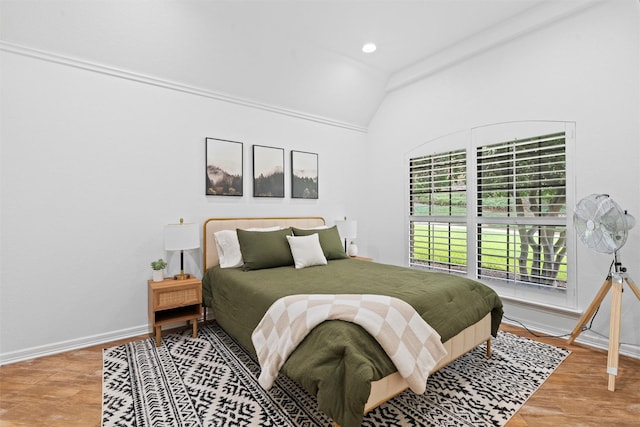 6005 Englishoak Dr, Arlington, TX 76016 - bedroom with vaulted ceiling and wood finished floors