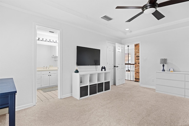 living room with light colored carpet, ceiling fan, ornamental molding, and sink