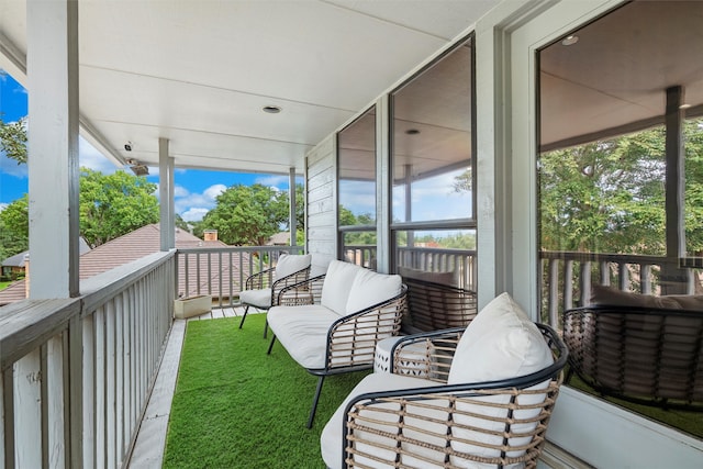 balcony featuring a porch