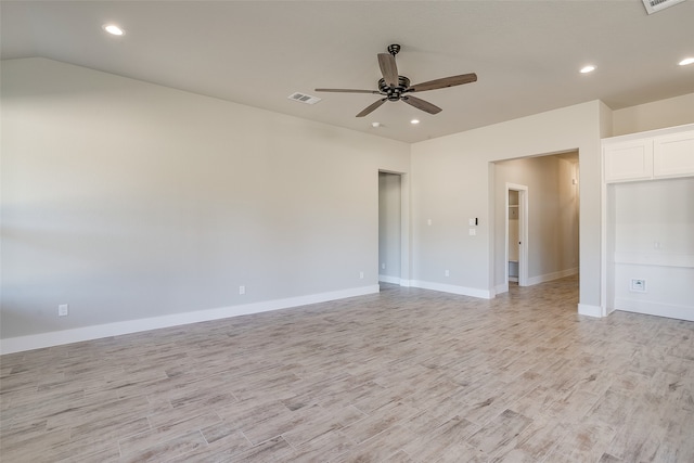 unfurnished room featuring ceiling fan and light wood-type flooring