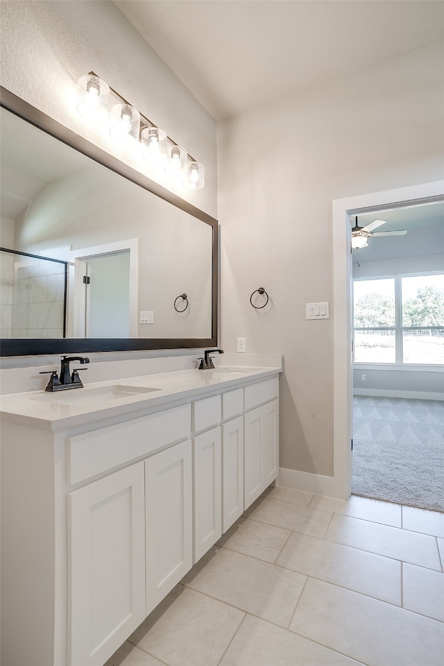 bathroom featuring ceiling fan, tile patterned flooring, and vanity