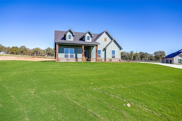 view of front of home with a front yard